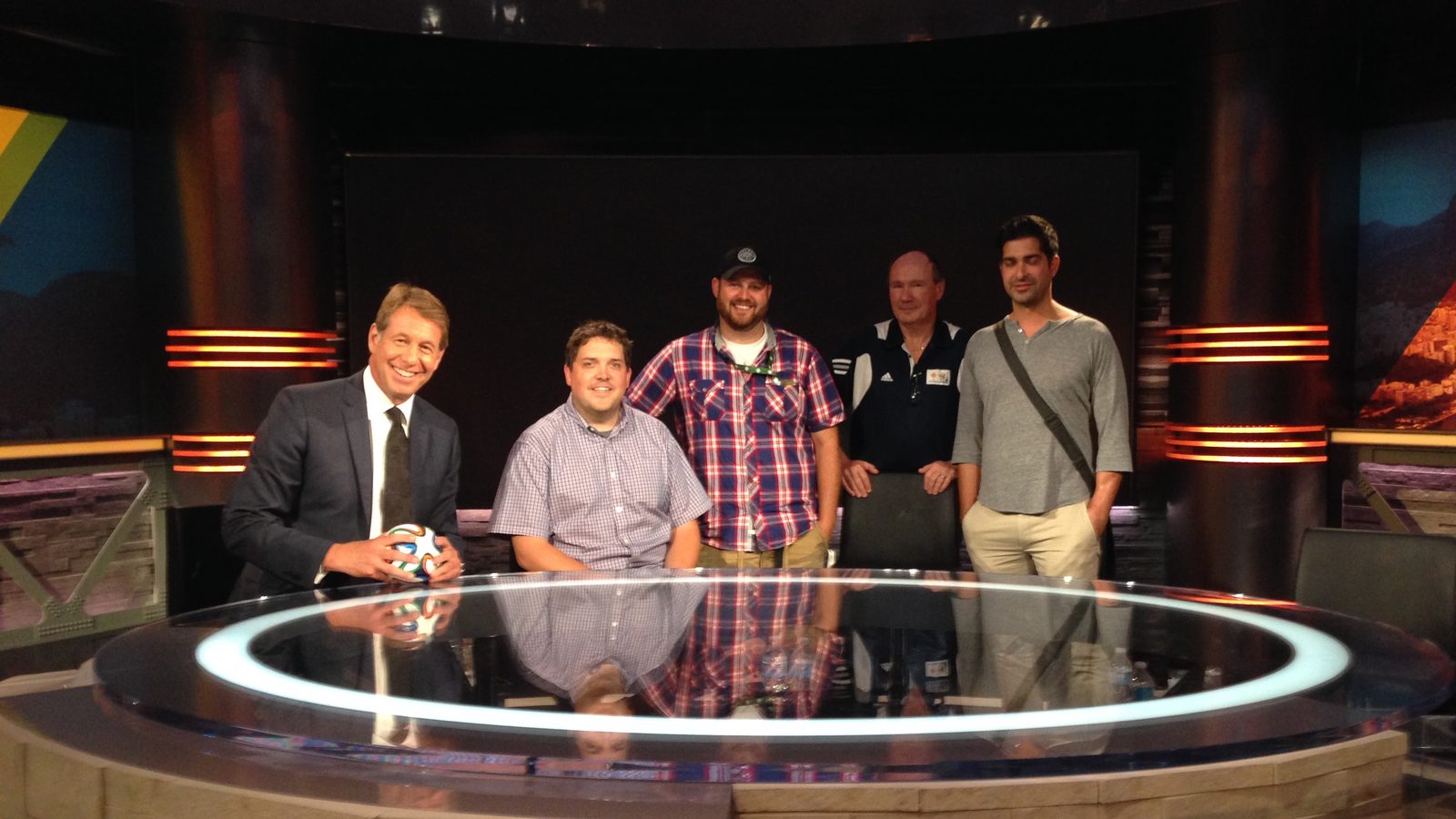 Brian Johnston with the technical crew on the FIFA World Cup studio set